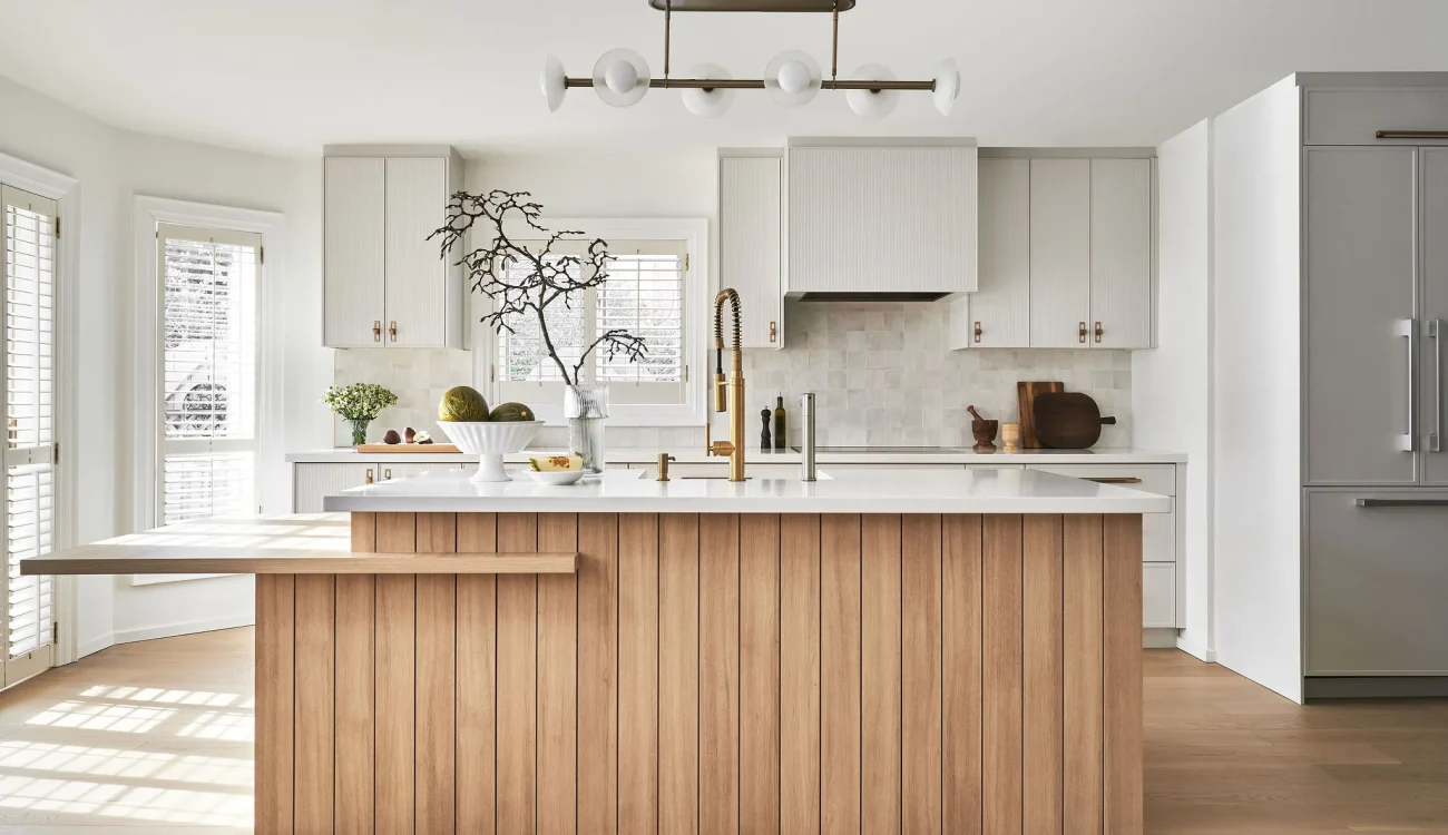 Interior Design - Contemporary kitchen featuring a wooden island and modern fixtures. Dexign Matter Studio