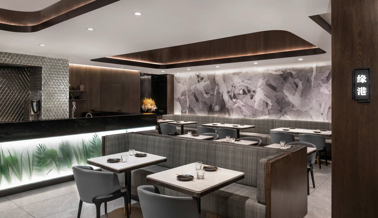 Interior Design - Interior view of a modern restaurant featuring sleek furniture and elegant decor. Dexign Matter Studio