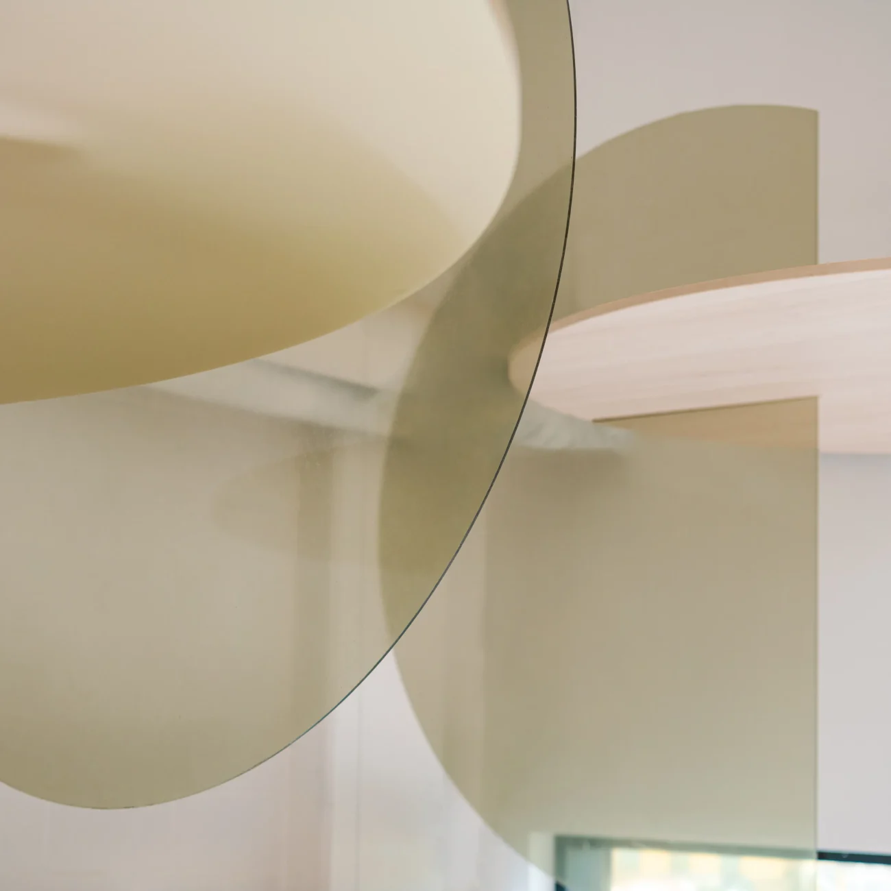 Interior Design - Abstract design featuring overlapping glass and wooden elements in a neutral color palette. Dexign Matter Studio